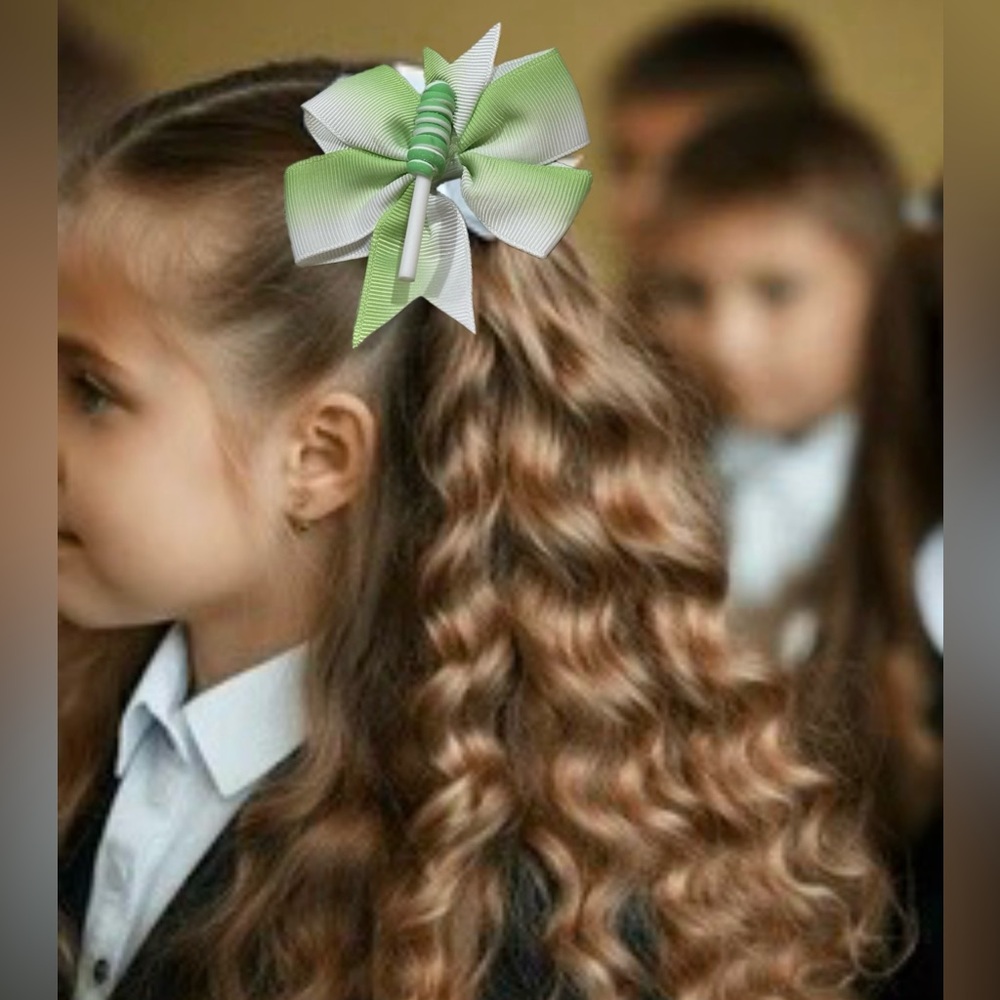 Girls green and white alligator hair clip with green white swirl lollipop charm